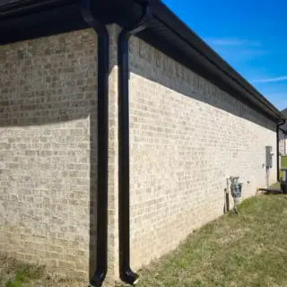 Professional installation of seamless gutters.