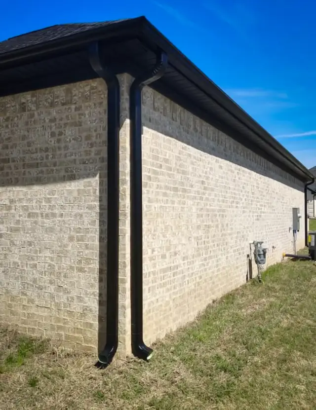 Professional installation of seamless gutters.