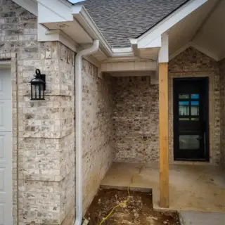 Gutter installation for a newly constructed home.