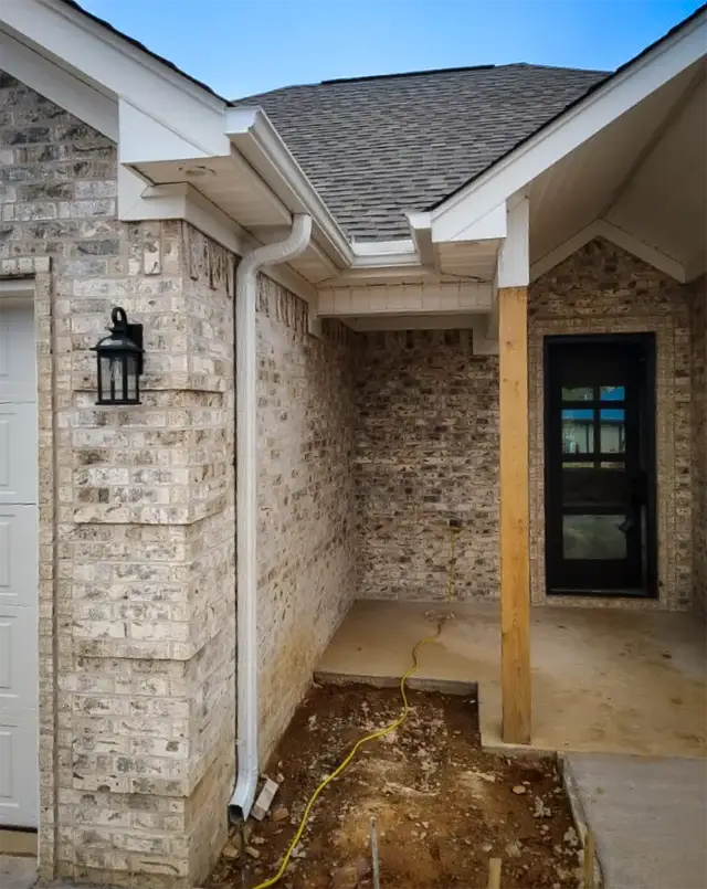Gutter installation for a newly constructed home.